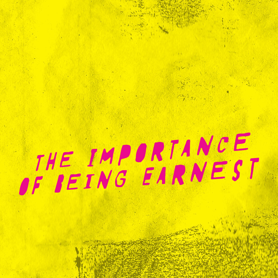 The Importance of Being Earnest, in an irregular magenta font on a grungy background of yellow, crinkled-paper texture.