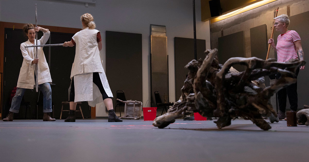 L to R: Dana Green, Lauren Bloom Hanover, and Amanda K. Cole work on a fight scene in rehearsal for Macbeth.