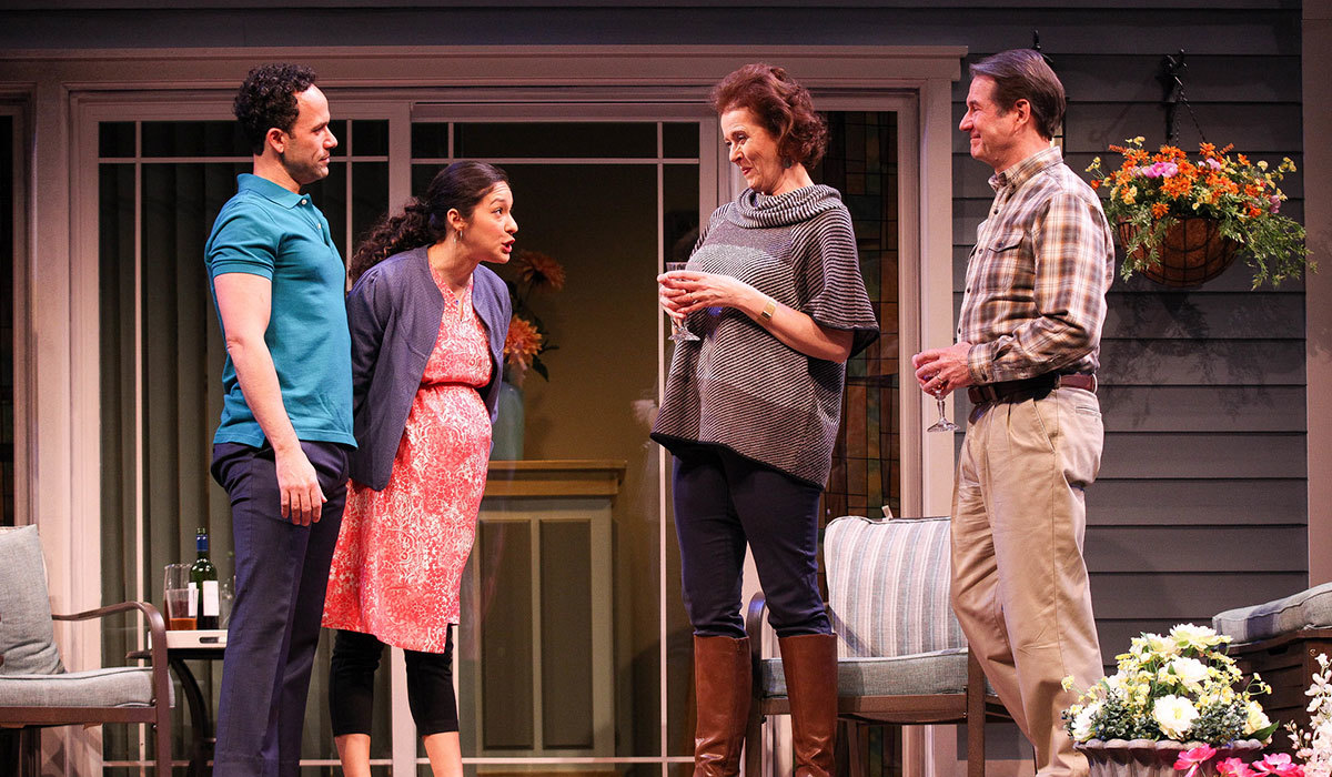 L to R: Erick González, Monica Rae Summers Gonzalez, Anne-Marie Cusson, and Paul DeBoy in Native Gardens at Syracuse Stage (photo by Michael Davis/Courtesy of Syracuse Stage)