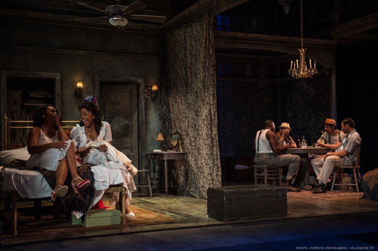 L-R: Kristen Adele (Stella), Deidrie Henry (Blanche), Demetrius Grosse (Stanley), Bobby Bermea (Steve), Gilberto Martin del Campo (Pablo) and Keith Eric Chappelle (Mitch) in Portland Center Stage's A Streetcar Named Desire. Photo by Patrick Weishampel/blankeye.tv.