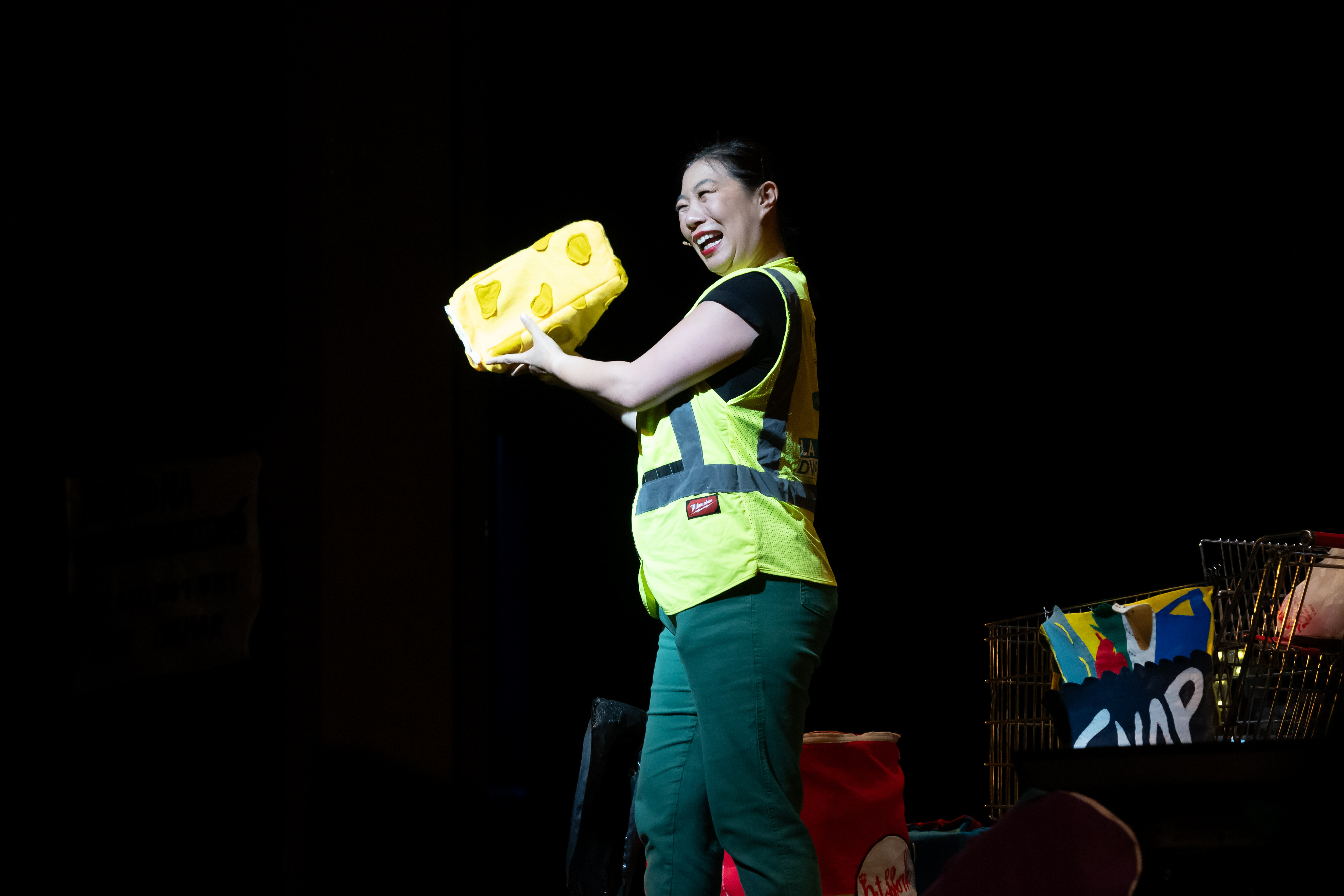Kristina Wong holding a piece of cheese